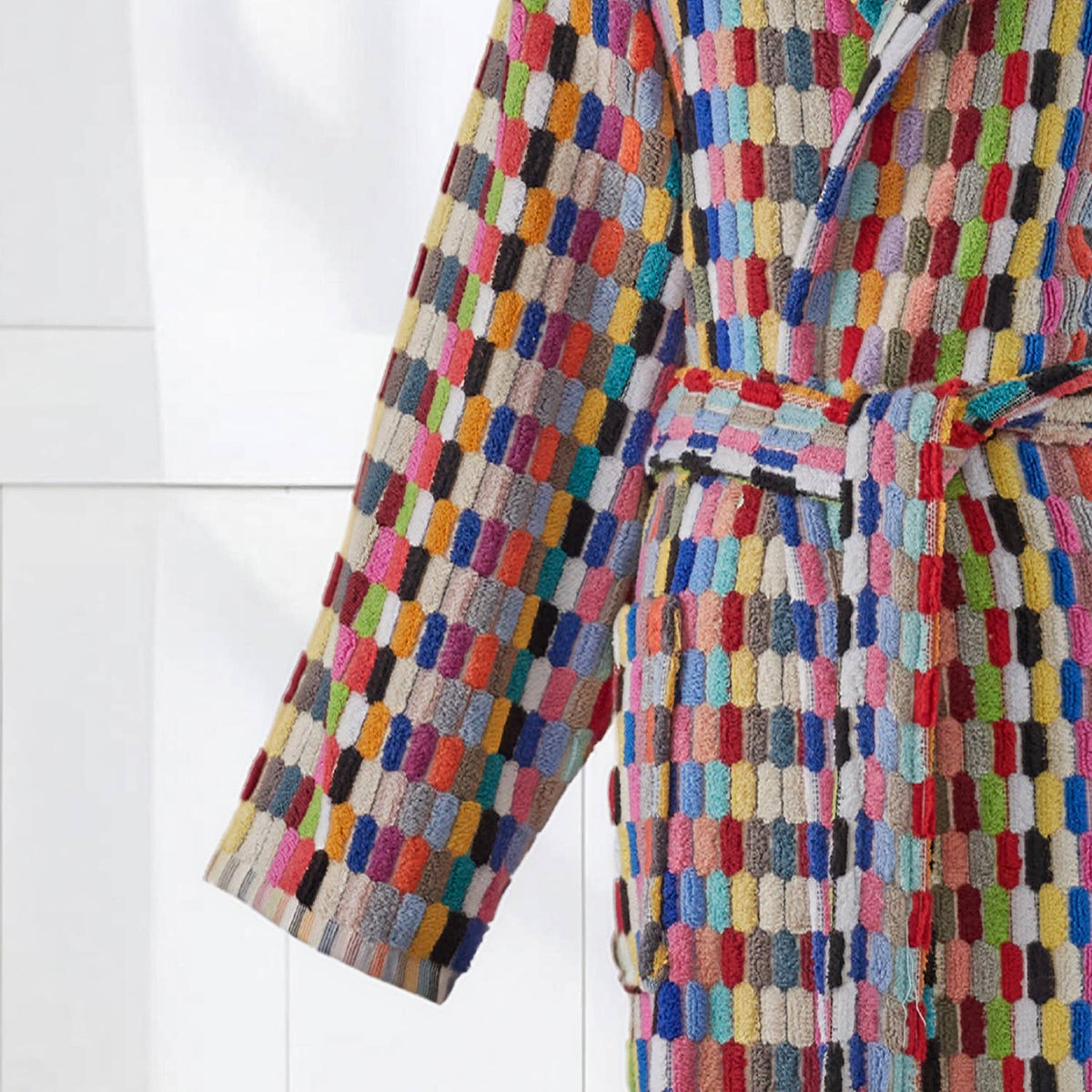 Multicolored textured robe on a white background