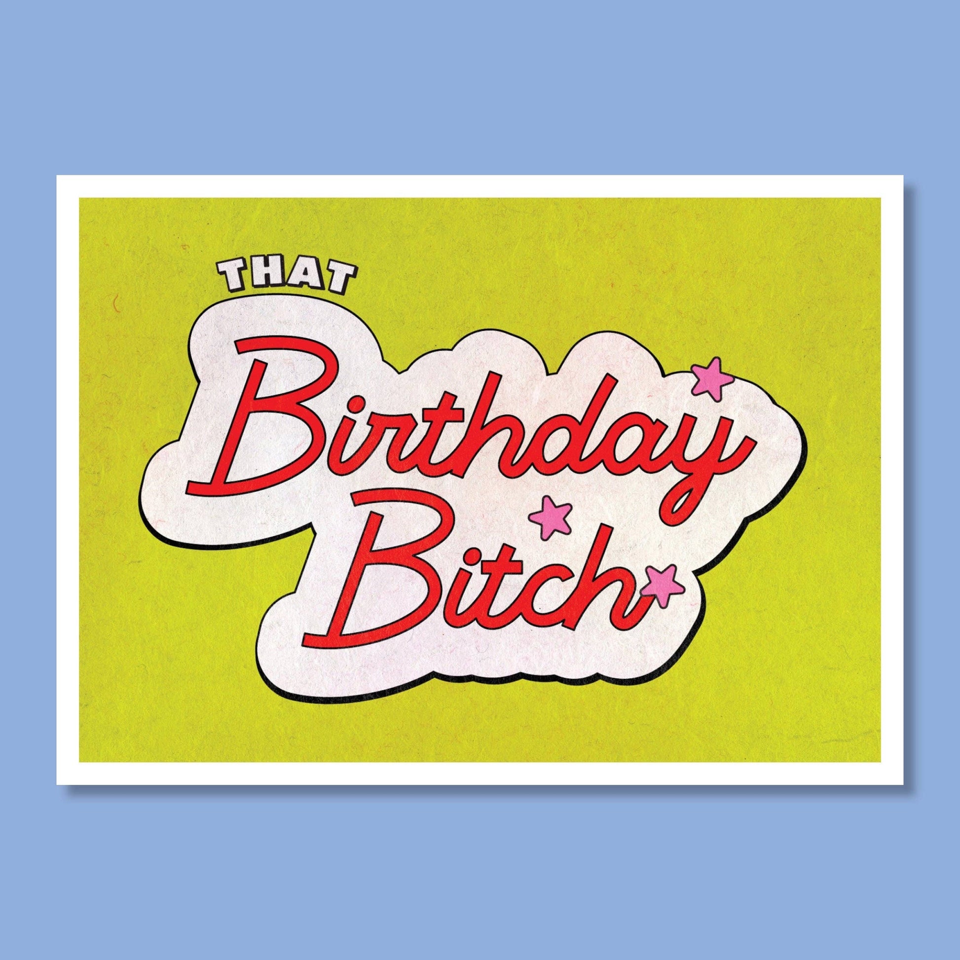 Gumdrop Studios That Birthday Bitch greeting card with red script text on a textured lime green background with pink stars.